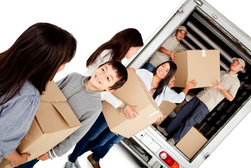 Moving boxes and recyclable materials prepared for sustainable removal in Sutton