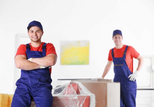 Office relocation team preparing business equipment for a move in Sutton