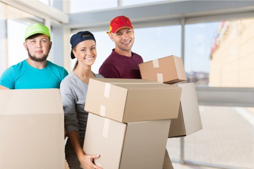 Packing and loading furniture into a removal truck