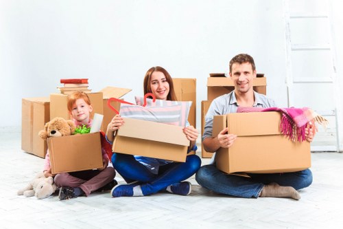 Professional packing team preparing boxes for a home move in Sutton