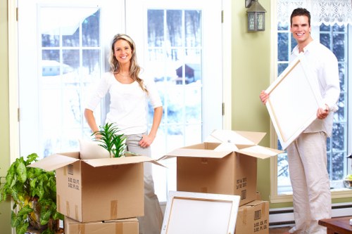 Stack of labelled moving boxes prepared for a Sutton property move